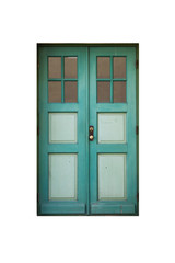 Green wooden door with windows in old building facade