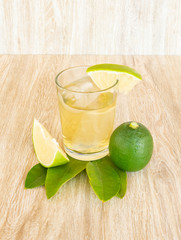 Ice lemon tea on a brown wooden table