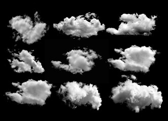 set of white clouds isolated on black background