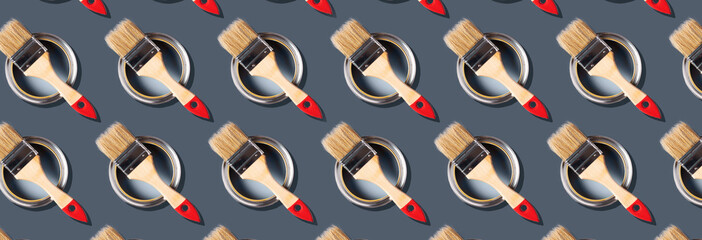 Brush and open paint can pattern on grey background. Top view, copy space. Creative design for packaging. Appartment renovation, repair, building and home design concept.