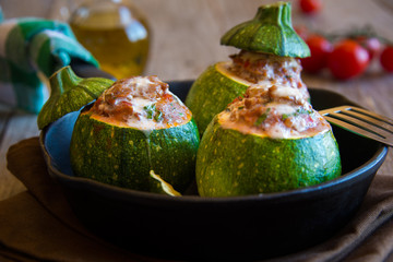 Stuffed round zucchini with meat and parsley, stuffed vegetables