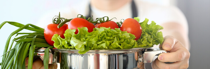 Chef Blogger Holding Vegetable Variety Saucepan