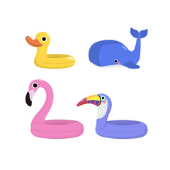 Summer with pink flamingo, violet toucan, blue whale and yellow duck swim rubber ring. Cute animal pool toys float on the pool.