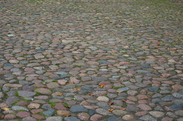 Ancient cobblestone covering of the old square