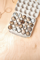 Quail eggs  on the  wooden table 