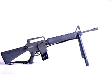 Mini rifle toy in a white background