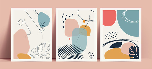 Abstract terrazzo style background set with pastel color hand drawn geometric shapes and lines and tropical leaves silhouettes. Works for decor wall prints or book cover or flyer or menu design. © paul_craft