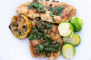 Greek lemon chicken and brussels sprouts with parsley