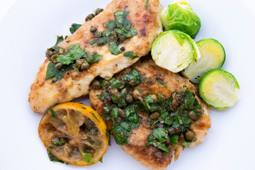Greek lemon chicken and brussels sprouts with parsley