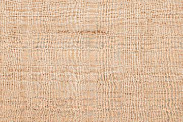 Brown linen fabric texture or background.