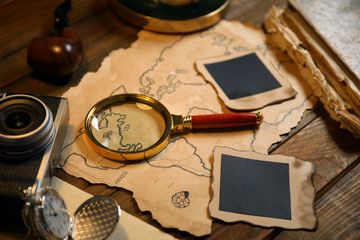 Composition with vintage detective items on wooden table