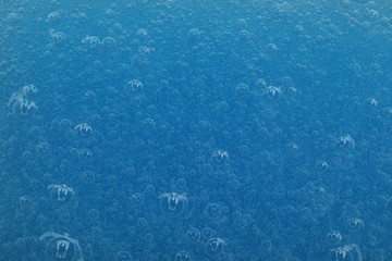 Sample of blue cosmetic gel as background, closeup