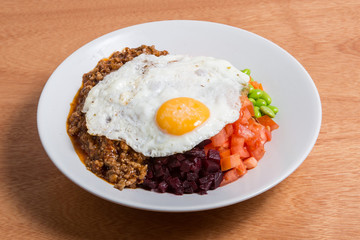 Korean bibimbop with egg on top.