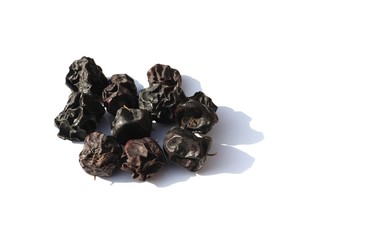 Dry Jujube or Ziziphus Jujuba Fruit Isolated on White Background with Copy Space 
