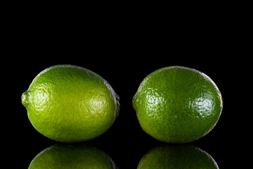 clean washed lime with drops of water on a black or white background isolated