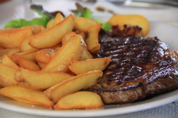 grilled steak with potatoes