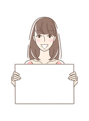 笑顔でフリップを持つ正面向きの女性