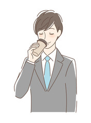 テイクアウトのコーヒーを飲む男性