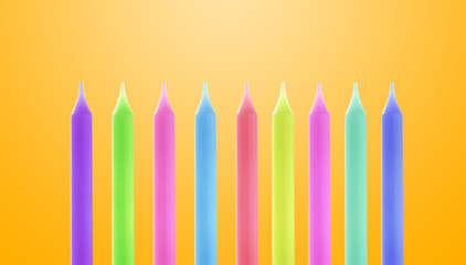 Set with colorful birthday candles on yellow background