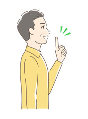 笑顔で指をさす男性の横顔