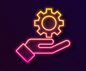 Glowing neon line Settings in the hand icon isolated on black background.  Vector Illustration