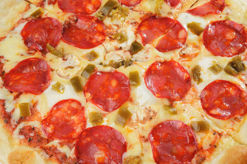 Classic italian pizza with pepperoni and cheese close-up