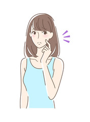 頬をつんつんしてがっかりする女性