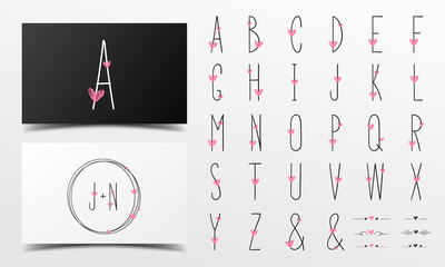 Cute alphabet in handwritten style decorated with pink heart.