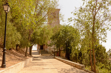 Walkway Leading To The Main Facade Of The Church Of San Juan In Hita. July 23, 2019. Hita Guadalajara Castilla La Mancha. Spain. Travel Tourism Holidays