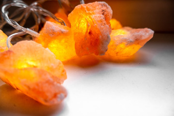 bright orange salt lamp fairylights