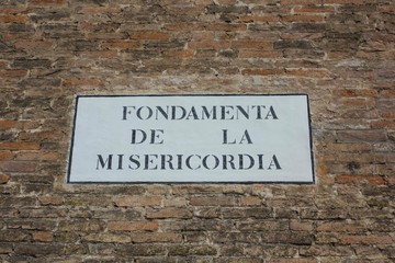 Fototapeta premium Road sign of Fondamenta de la Misericordia in Venice