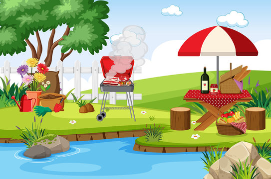 Scene with BBQ grill and food on the picnic table in the park