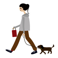 歩く女性と犬