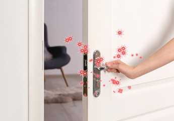 Abstract illustration of virus and woman opening wooden door, closeup. Avoid touching surfaces in public spaces during COVID-19 pandemic