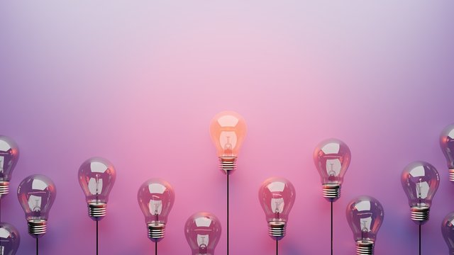 Standing out idea lightbulb concept, room for text