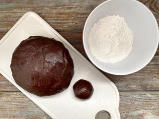 chocolate cookie dough and powdered sugar, ready for baking cookies.