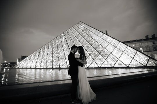 Happy bride and groom enjoying their wedding in Paris