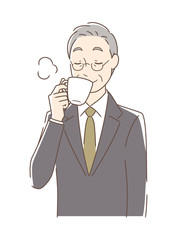 マグカップのコーヒーを飲む男性