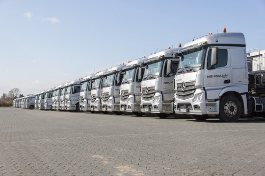 BURG / GERMANY - JUNE 11, 2017: german Mercedes Benz Actros trucks from haulage firm Neumann stands in a row.