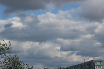 Fototapeta premium clouds over the city