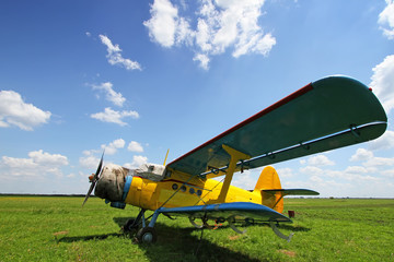 Crop duster airplane on airfield