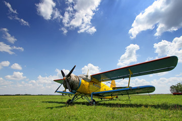 Crop duster airplane on airfield