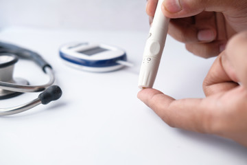 man checking blood sugar level, Top view 