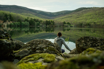 a man alone at a lake