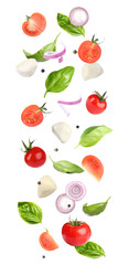 Mozzarella cheese, tomatoes, onion and basil leaves falling on white background