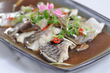 steamed fish, steamed striped bass or stewed fish