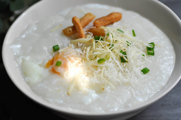 rice gruel, rice porridge or congee with egg