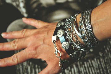 Handmade leather and silver bracelet , close up fashion jewelry photo.