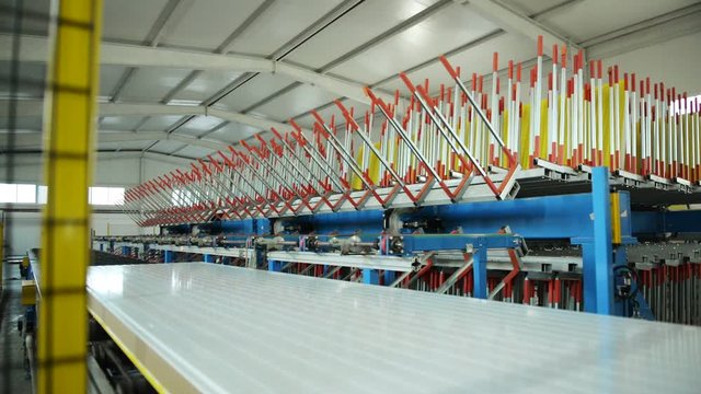 Cooling conveyor. Sandwich panel production.