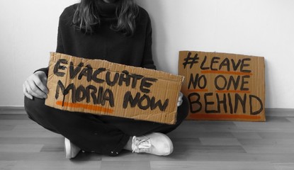 Leave No One Behind online strike protest picture of an activist.